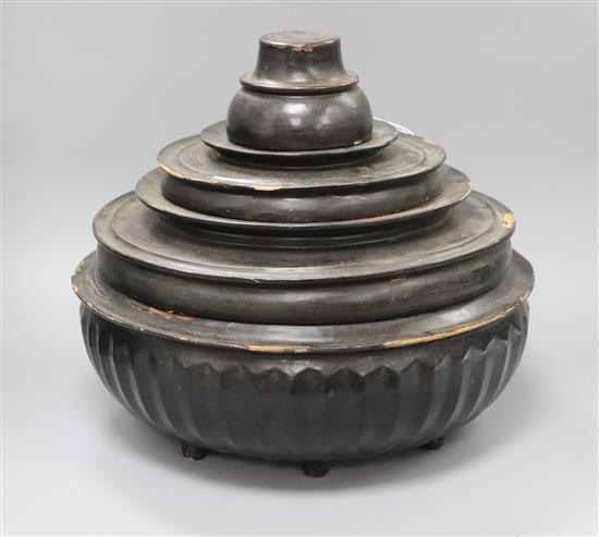 A group of Middle Eastern lacquered stacking boxes